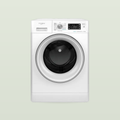White freestanding washer-dryer with a silver-trimmed door, a programme dial and a digital display, on a pale sage background