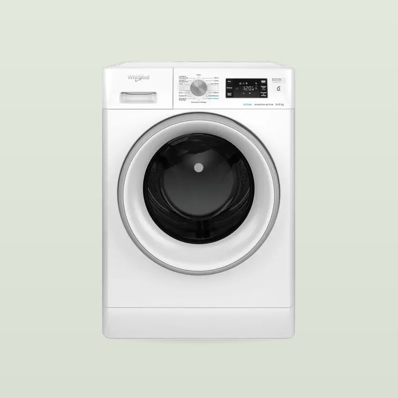White freestanding washer-dryer with a silver-trimmed door, a programme dial and a digital display, on a pale sage background