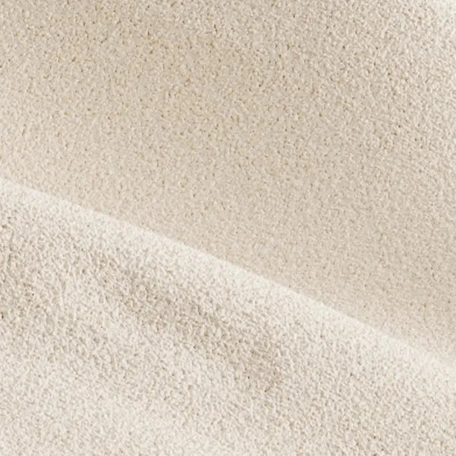 Close-up of the soft pale beige cover fabric