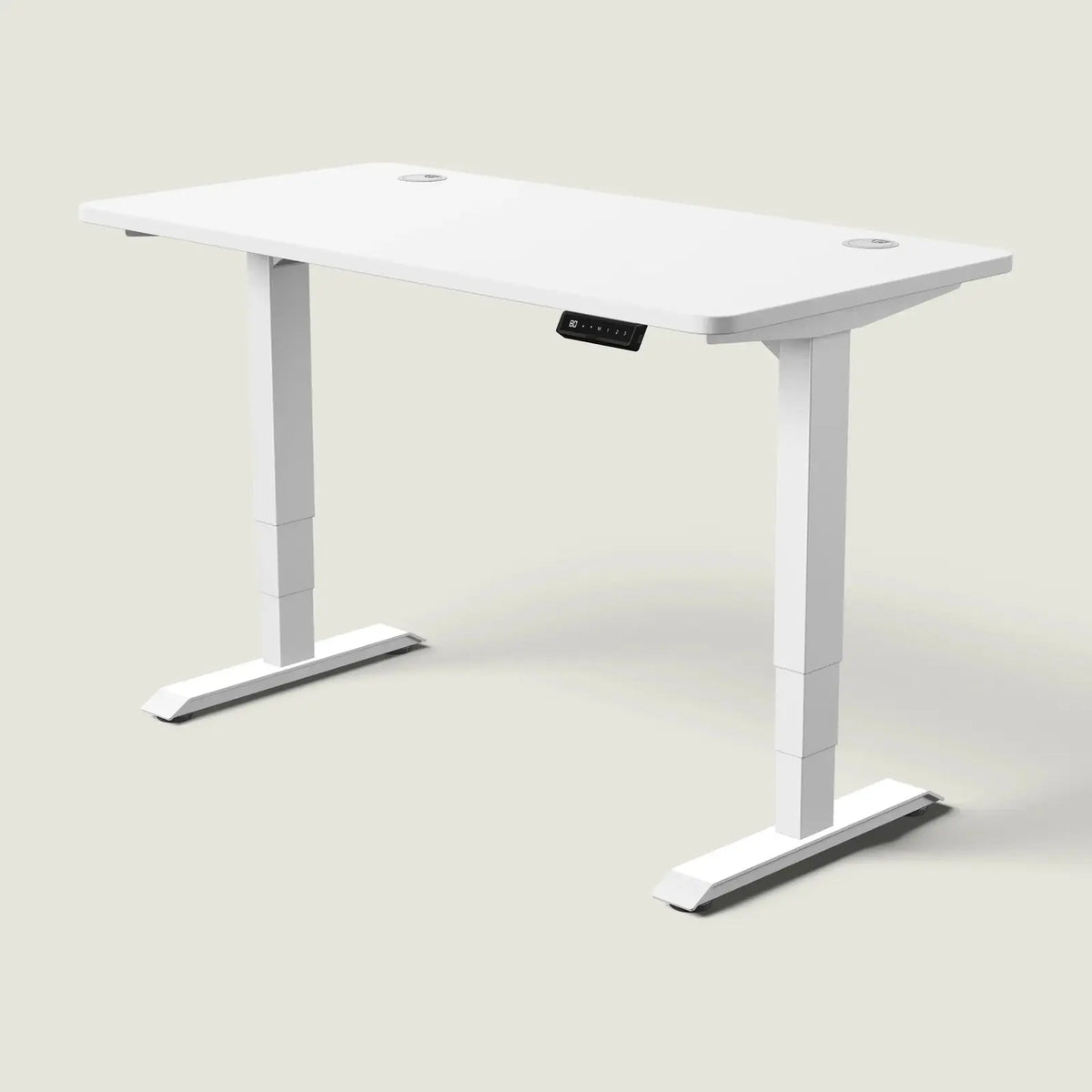 Electric standing desk, 140 × 70 cm, white frame and white top, with the memory handset under the front edge, on a pale grey background